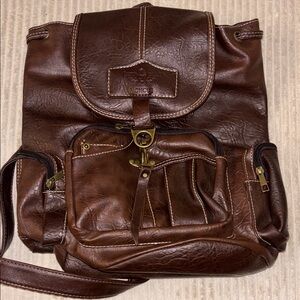 Rich Brown Leather Backpack with Stitched Detailing and Slouchy Elements